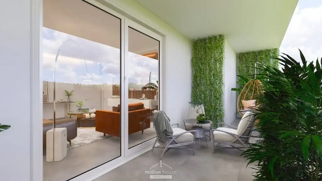 Stylish balcony with green wall and outdoor furniture in Seregno Lombardy.