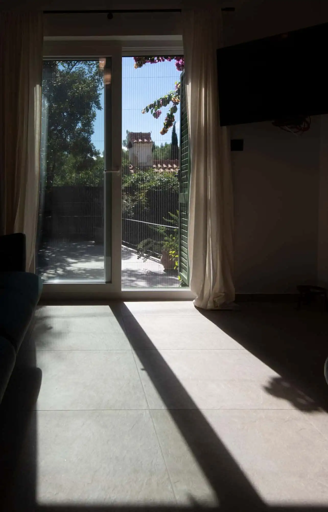 Modern interior with balcony view of Split’s exclusive area. Balcony view from a high single-storey house in Split's upscale neighborhood.