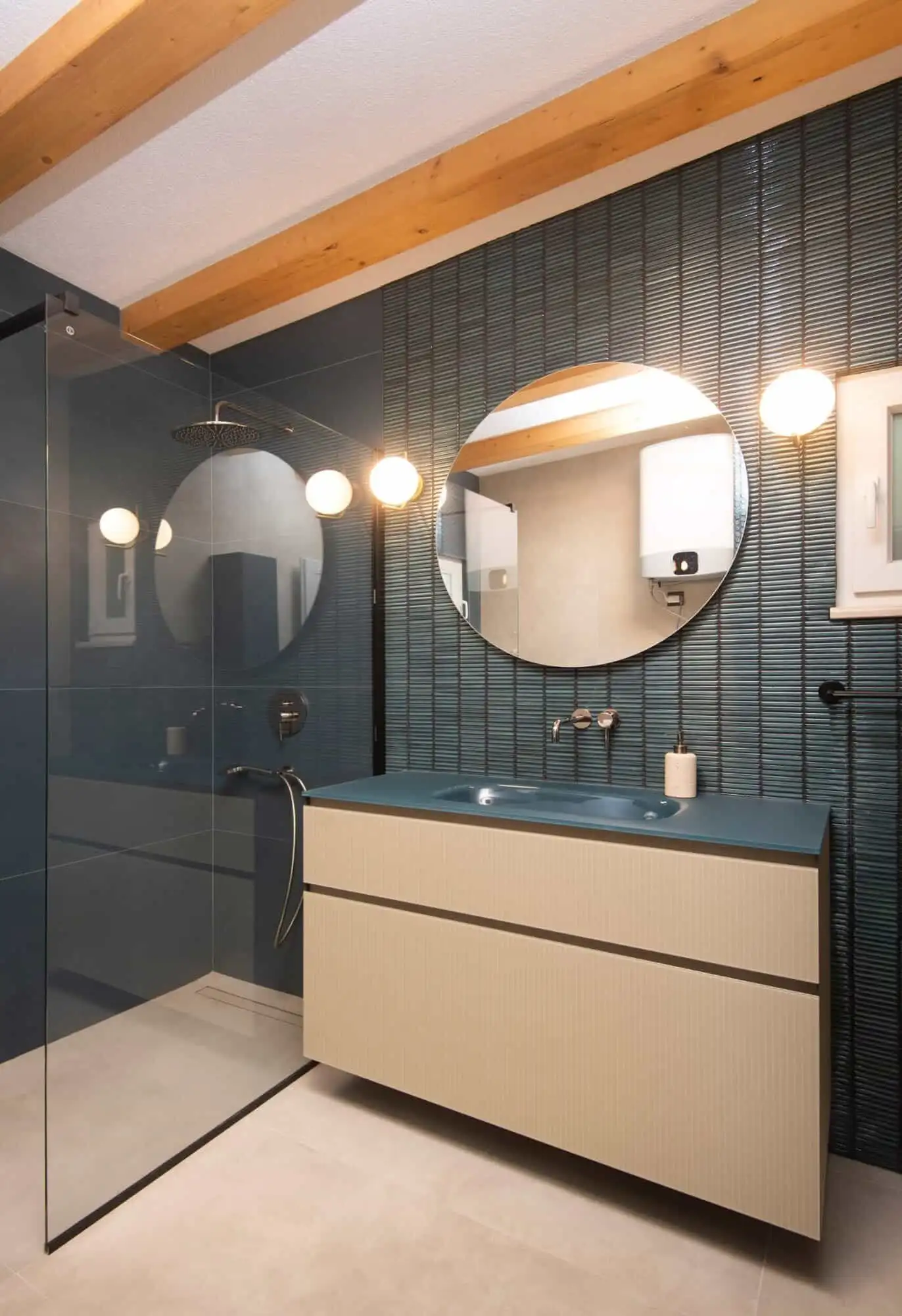 Modern bathroom with stylish fixtures and decor in a high-end Split house. Contemporary bathroom featuring sleek design, round mirrors, and modern lighting in an exclusive Spl.