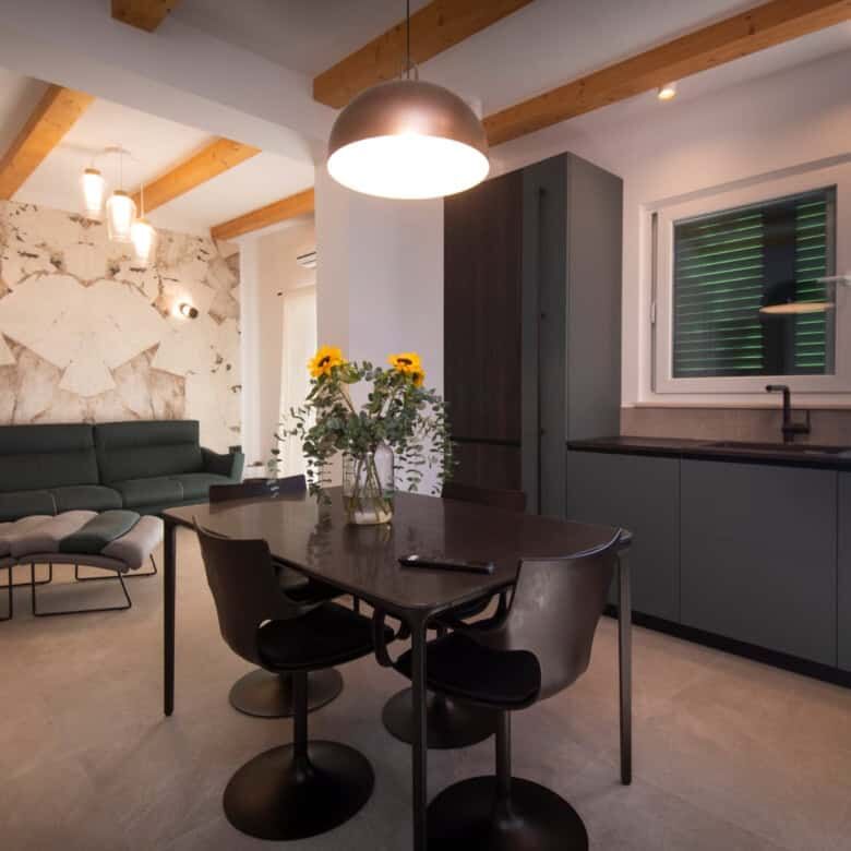 Modern Split single-storey house interior with open-plan living and kitchen space.