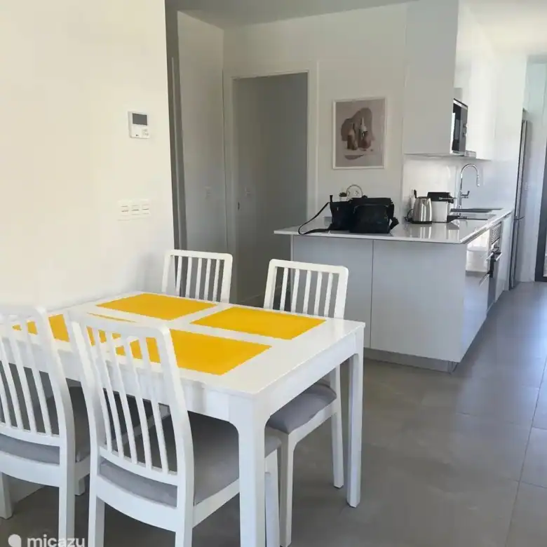 Bright interior of a 2-bedroom apartment in Santiago De La Ribera, Murcia, featuring a dining area a.