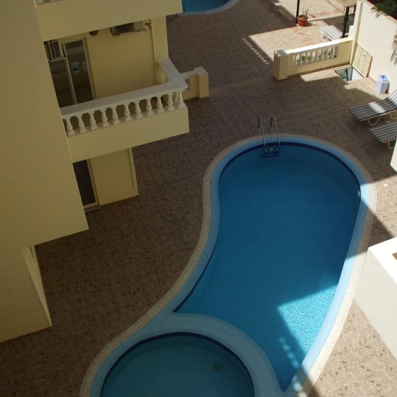 Pool view of luxury 1-bedroom apartment in Oasis 5 Hurghada.