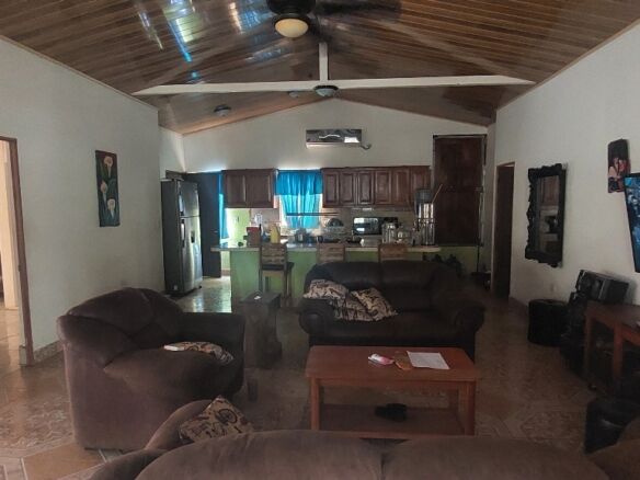 Comfortable living room with modern furnishings in a Granada home.