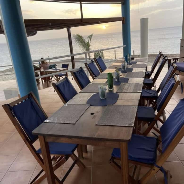 Restaurant dining area with ocean view in Maio Cape.