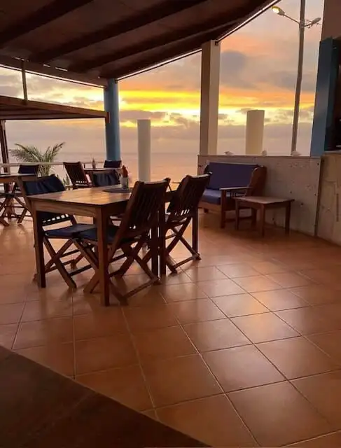 Sea view dining area with outdoor seating at Martin’s restaurant in Ponta Preta Maio Cape, perfect f.