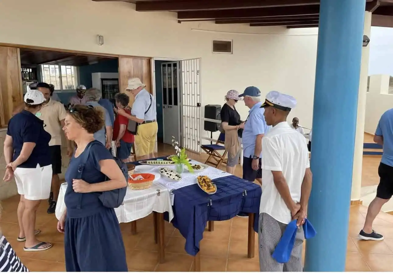 People gathering at Martin’s restaurant in Ponta Preta Maio Cape, ideal for investors.