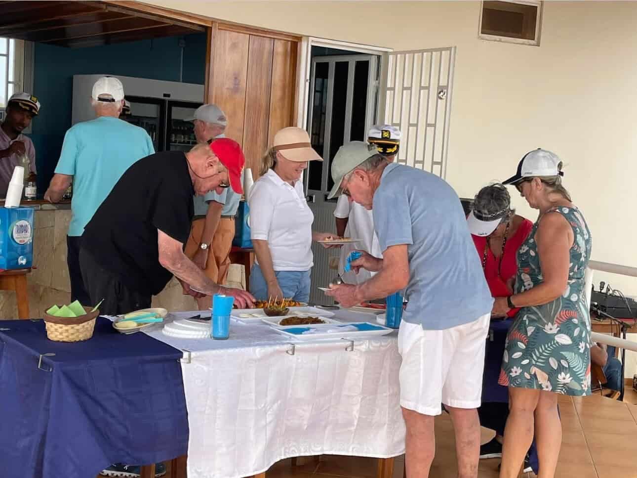 Martin’s restaurant for sale in Ponta Preta Maio Cape Restaurant dining scene with people enjoying food at Martin’s restaurant in Ponta Preta Maio Cape.