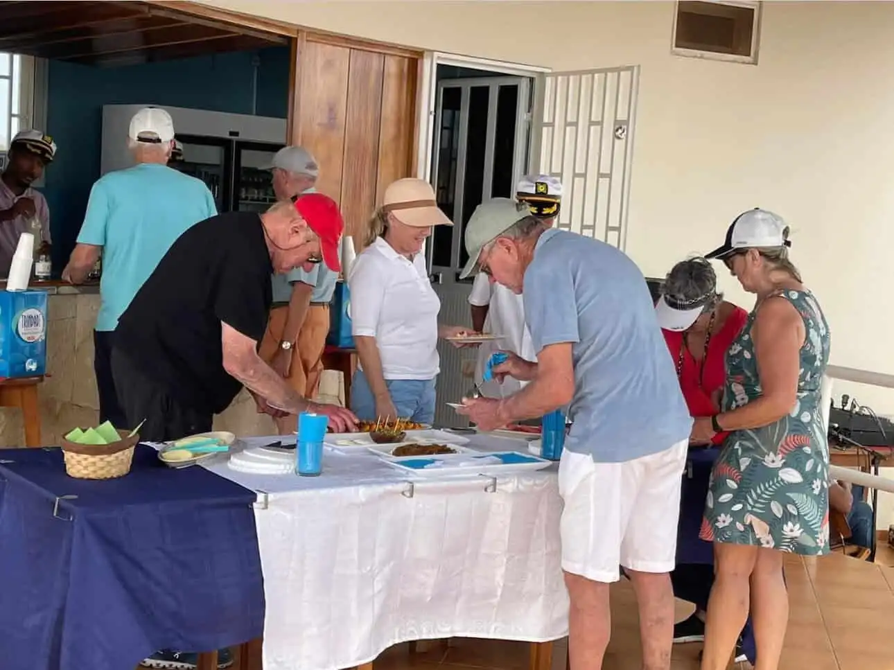 Restaurant dining scene with people enjoying food at Martin’s restaurant in Ponta Preta Maio Cape.