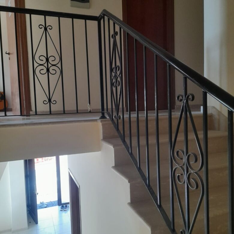 Modern staircase in a sunny villa in Aradippou, Larnaca, Cyprus.