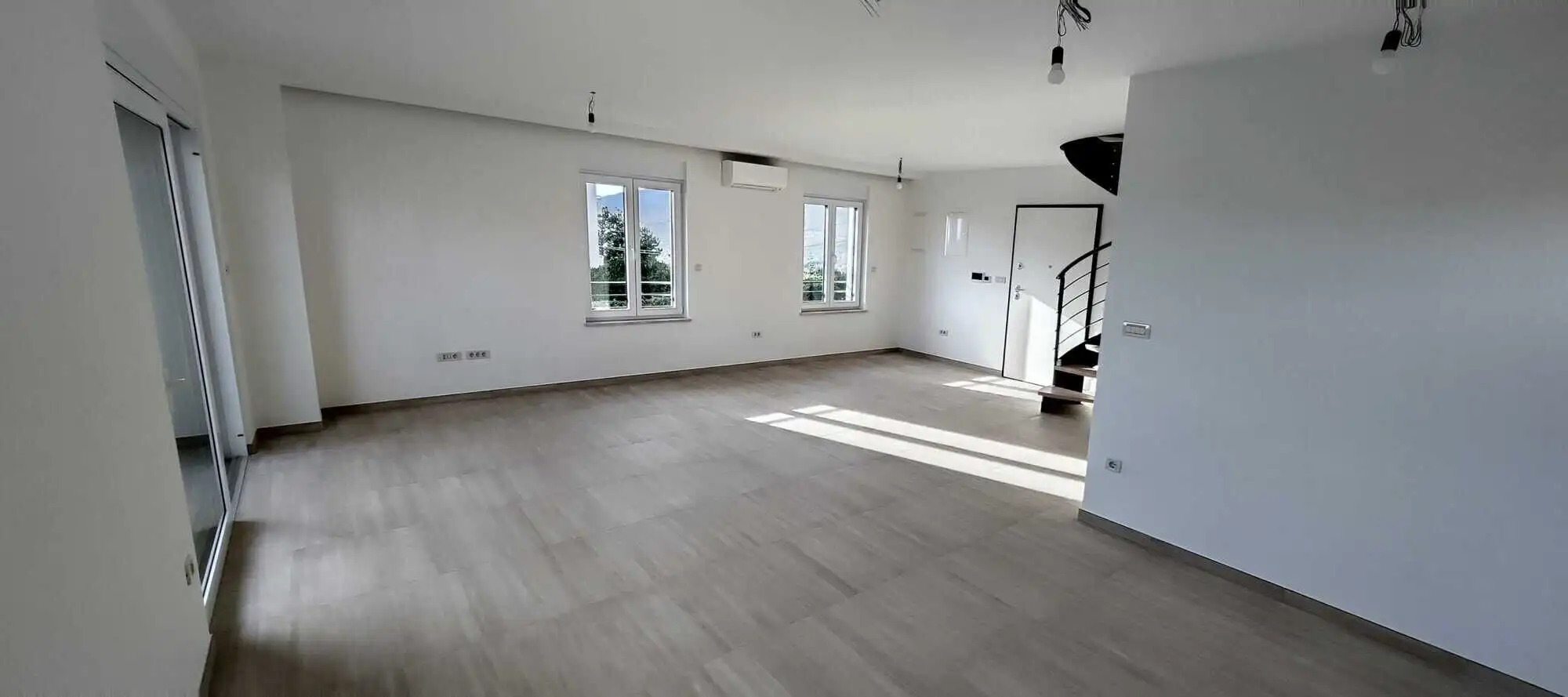 Modern Duplex Interior in Kvarner, near Rijeka Bright, spacious duplex interior with large windows in Kvarner near Rijeka.