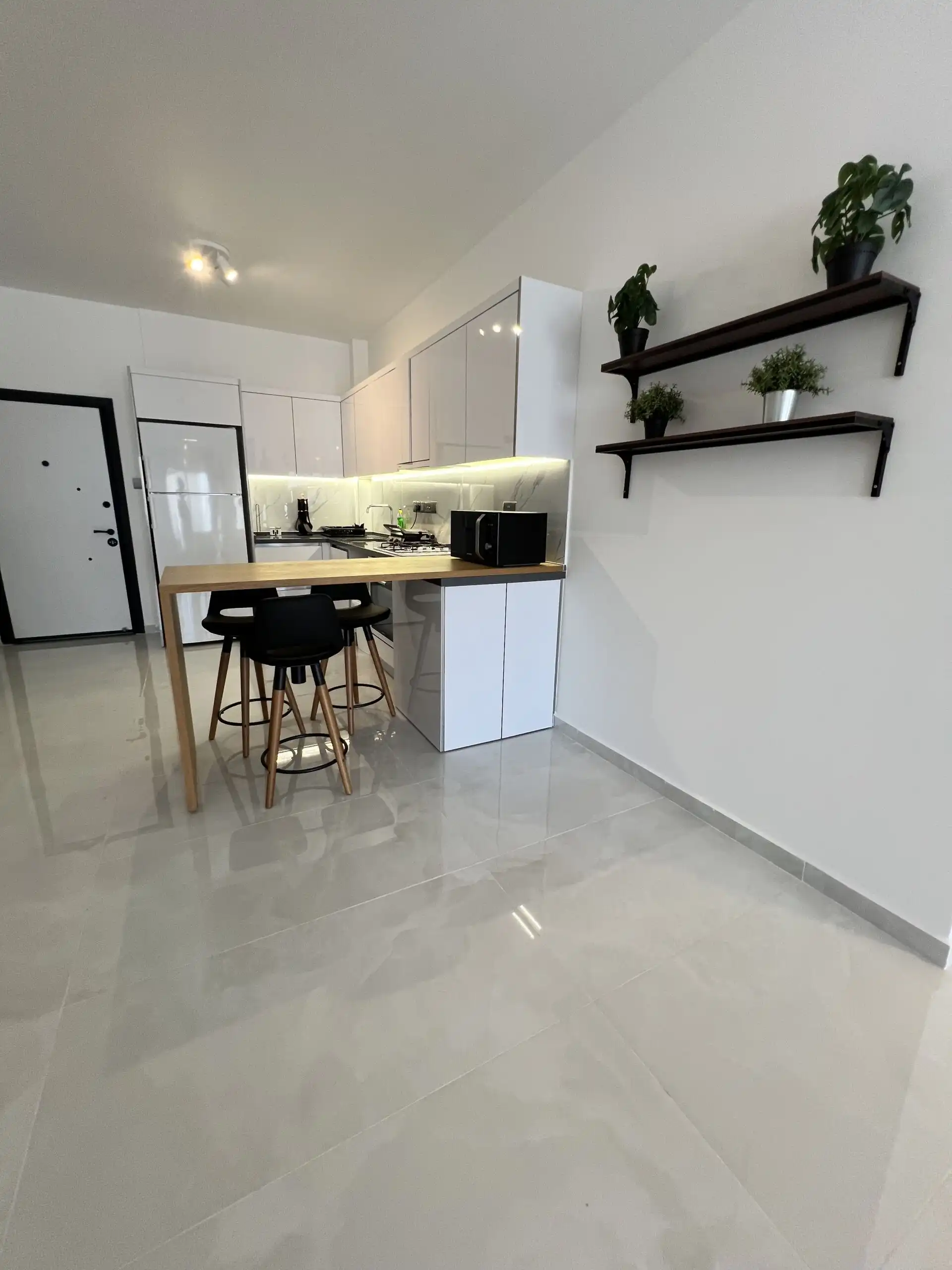 Modern 1+1 apartment interior at Caesar Resort, near Long Beach.