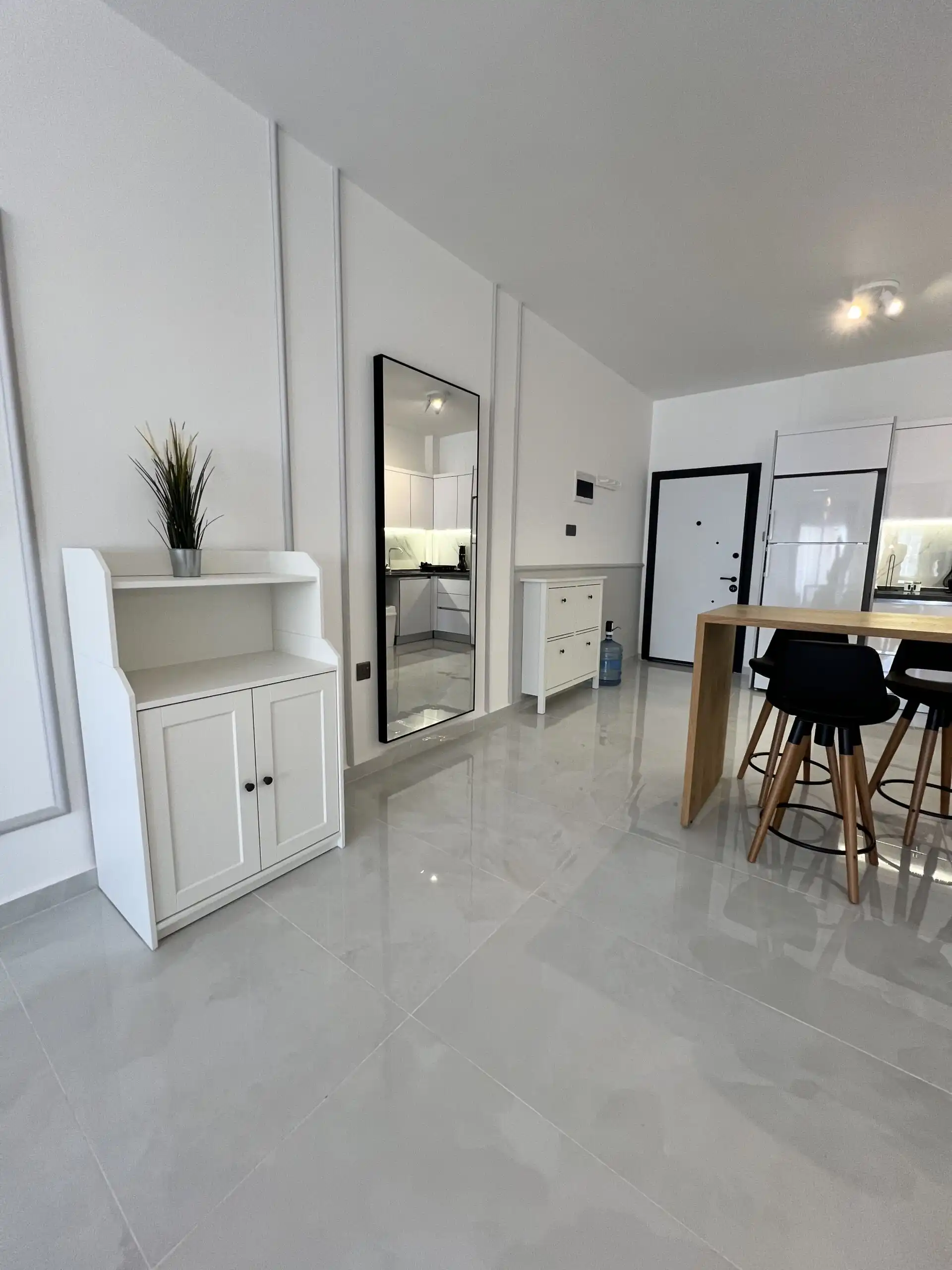 Bright modern 1+1 apartment interior in Caesar Resort near Long Beach.