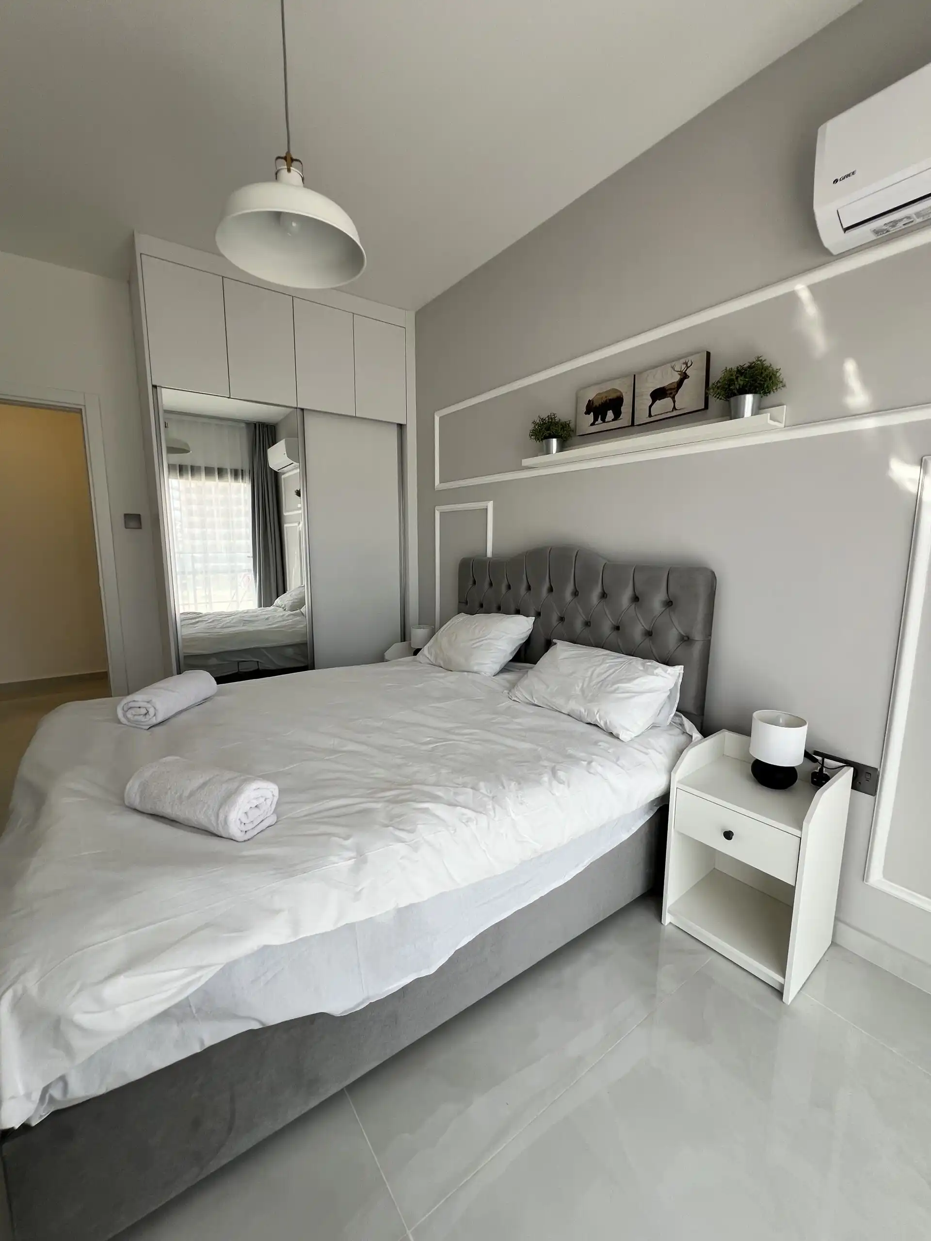 Spacious bedroom with modern decor in Caesar Resort, near Long Beach.