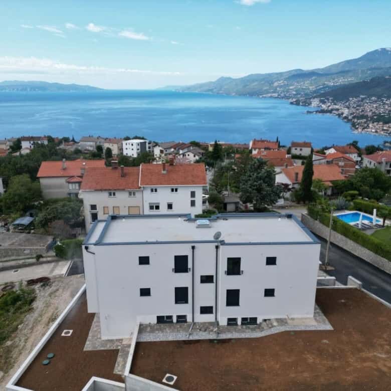 Duplex in Kvarner offers stunning sea views, modern design, and proximity to Rijeka, perfect for com.