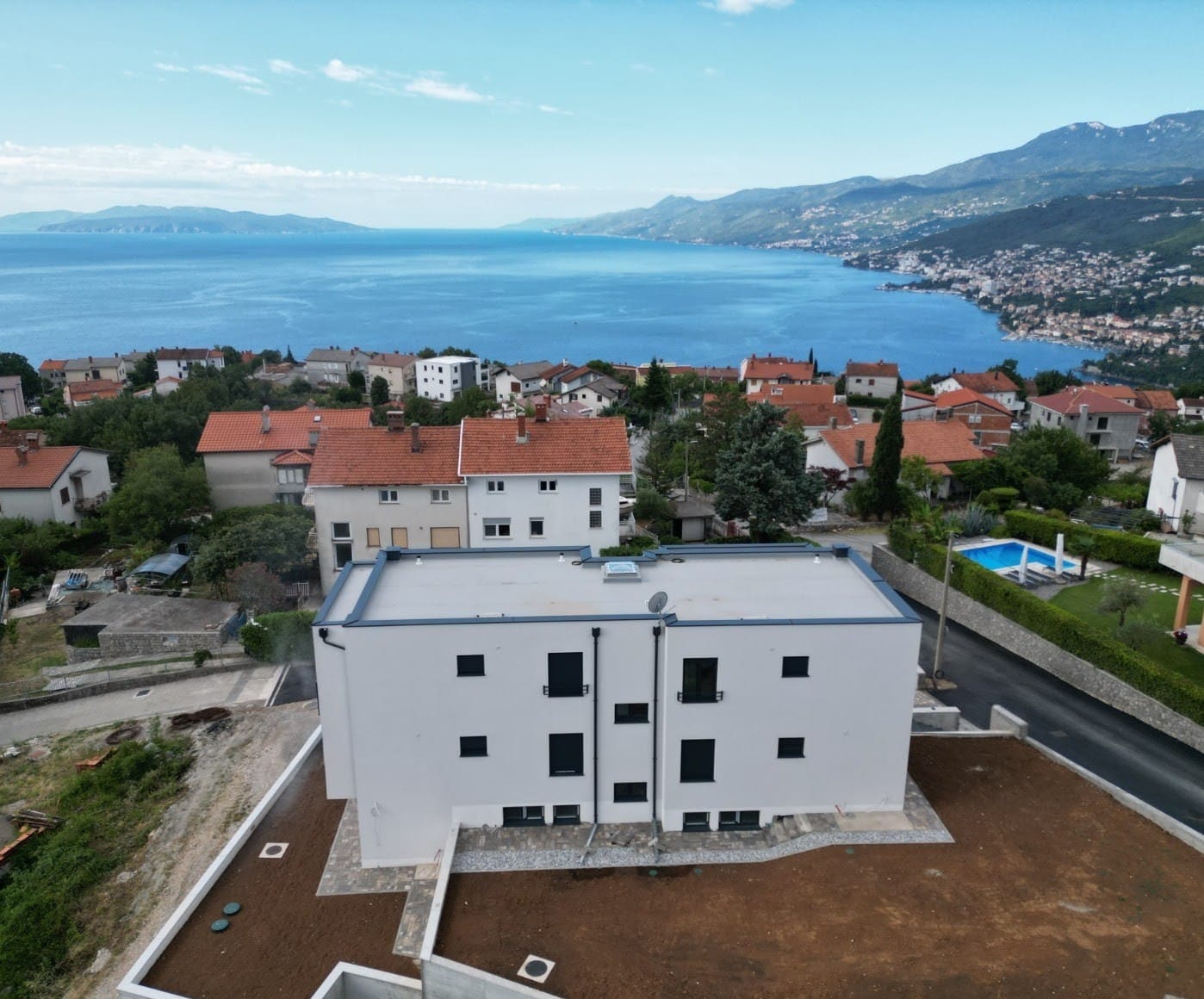 Modern duplex apartment with private garden in Kastav overlooking Croatia’s Kvarner Bay.”