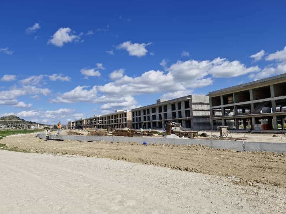 Modern 1-bedroom apartment building in Bogaz Iskele, North Cyprus, during construction.