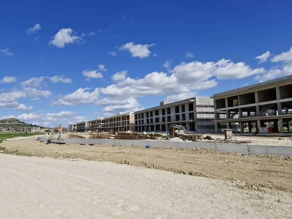 Modern 1-bedroom apartment building in Bogaz Iskele, North Cyprus, during construction.