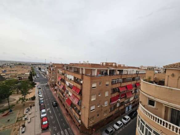 Spacious 2-bedroom penthouse apartment in Torrevieja featuring a large balcony and panoramic sea vie.