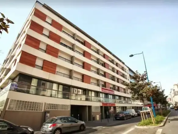 Contemporary apartment building in Paris with leaseback investment opportunity.