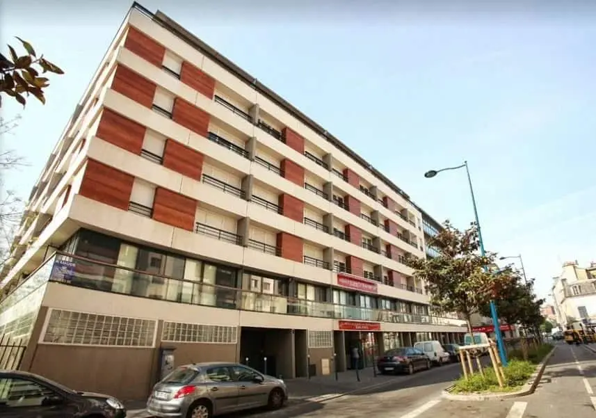 Contemporary apartment building in Paris with leaseback investment opportunity.