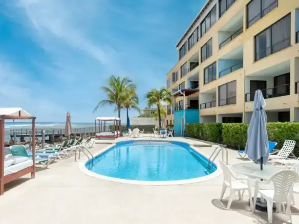Apartment with pool and ocean view in Christ Church, Barbados.