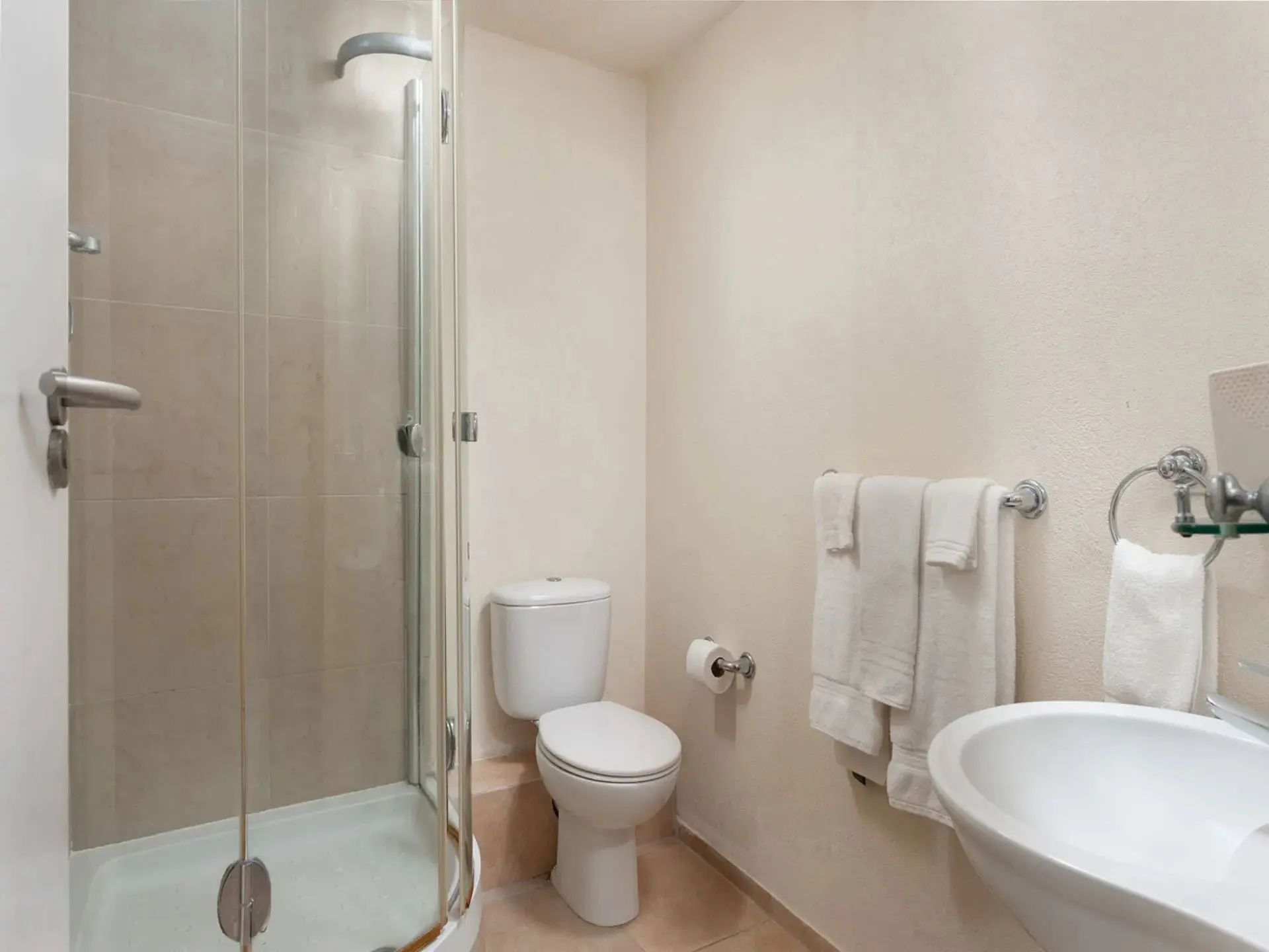 Luxury 2 Bed Apartment in St. Lawrence Beach Modern bathroom with shower in St. Lawrence Beach apartment.