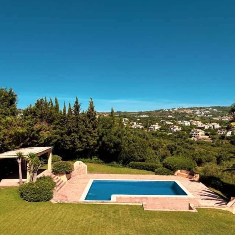 Elegant 7-bedroom villa featuring a private swimming pool and lush gardens in Calle Fondo, Sotogrand.