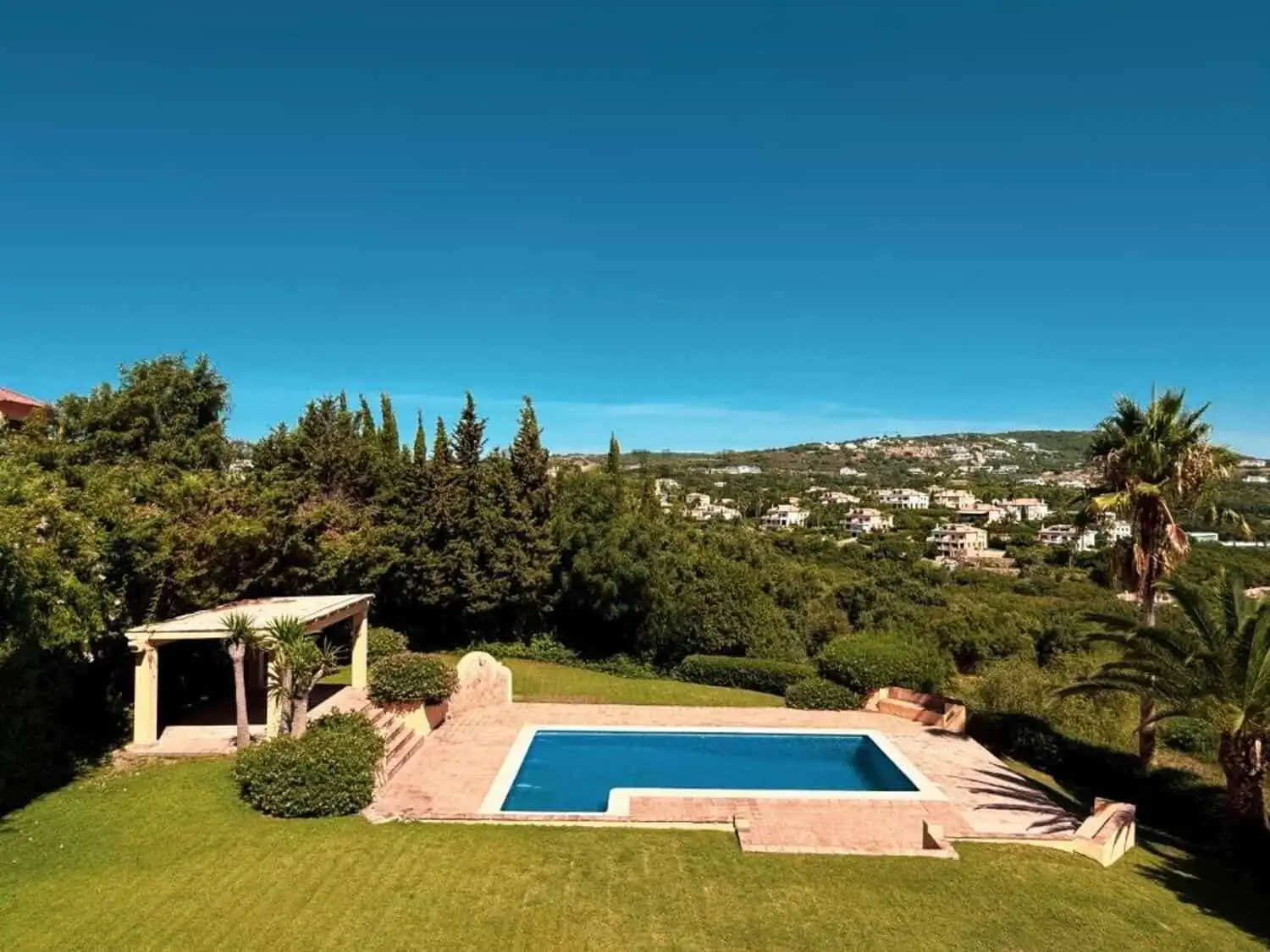 Elegant 7-bedroom villa featuring a private swimming pool and lush gardens in Calle Fondo, Sotogrand.