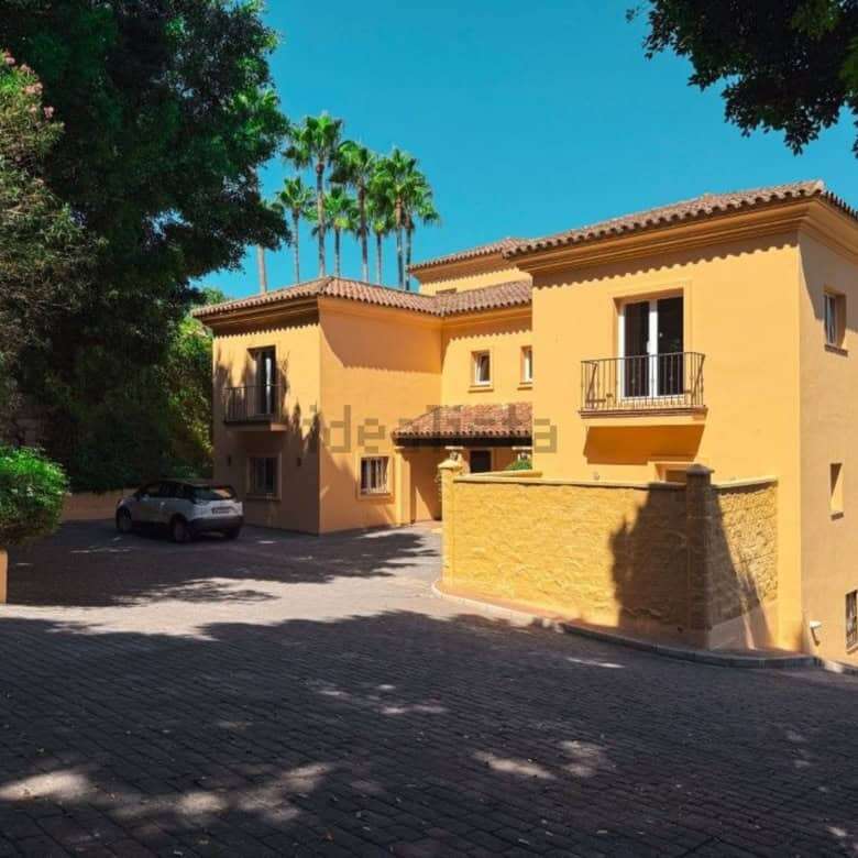 Stunning 7-bedroom villa for sale in Calle Fondo, Sotogrande, with beautiful outdoor spaces and mode.