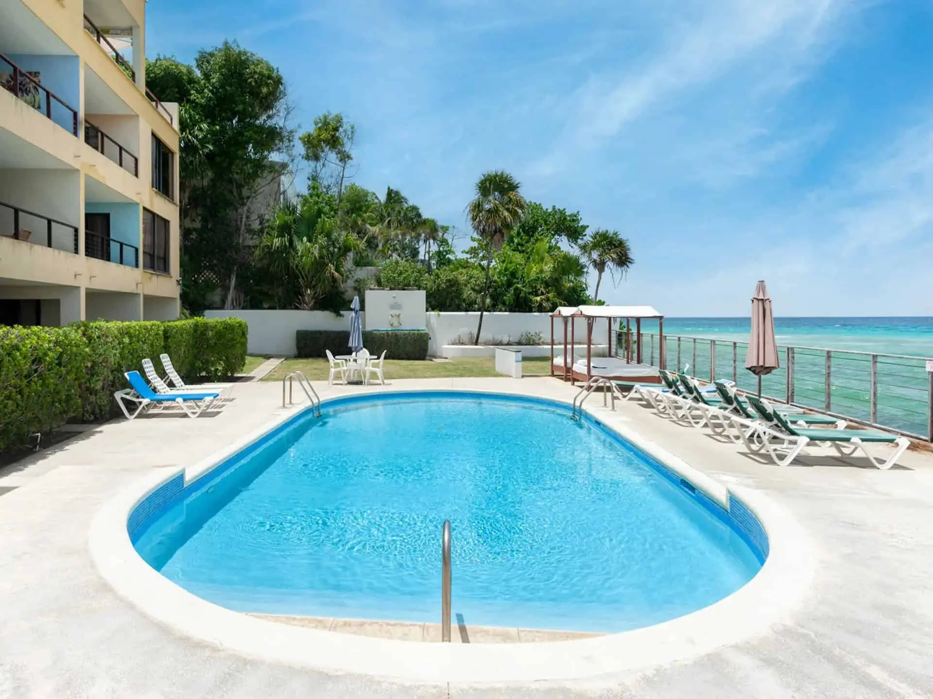 Luxury 2 Bed Apartment in St. Lawrence Beach Beautiful poolside view of a luxury 2-bedroom apartment near St. Lawrence Beach, Christ Church.