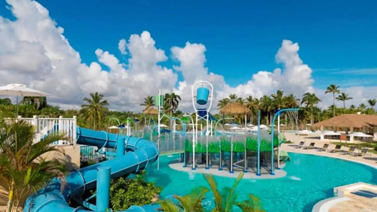 Water park with slides and splash zones at Coral Bahia Punta Cana resort.