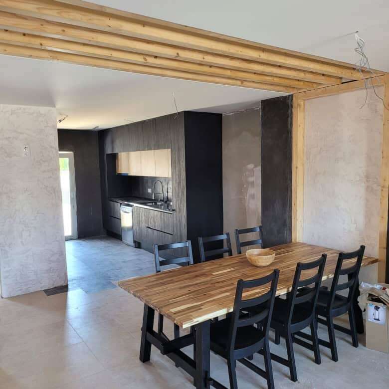 Modern dining area in a stylish villa in Setubal, Portugal.
