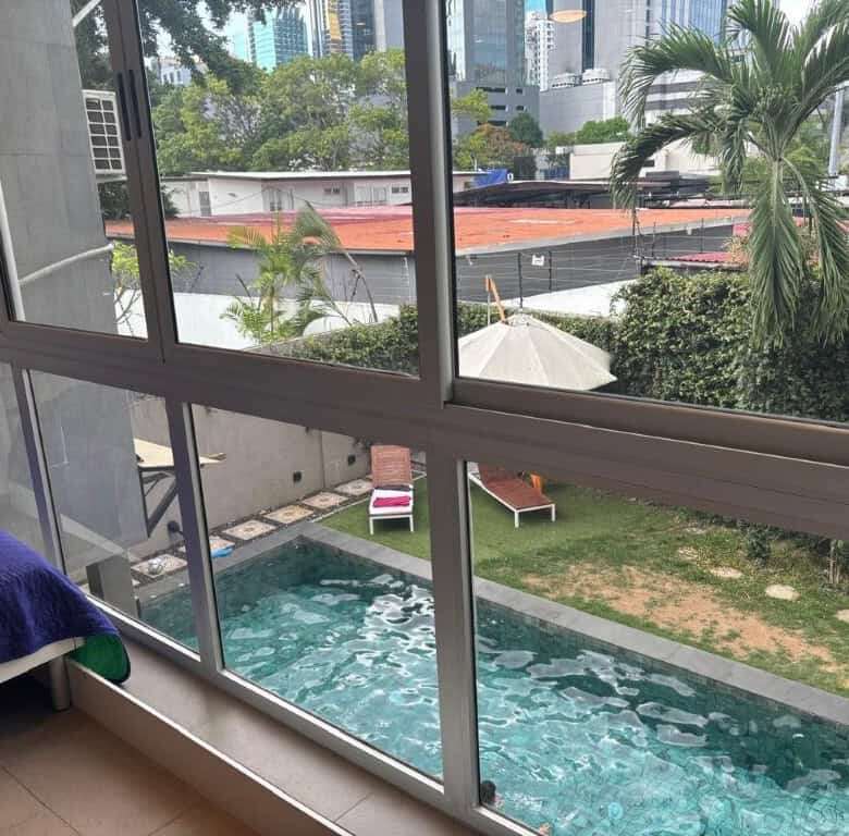 Luxury apartments with pool in Panama City skyline view.