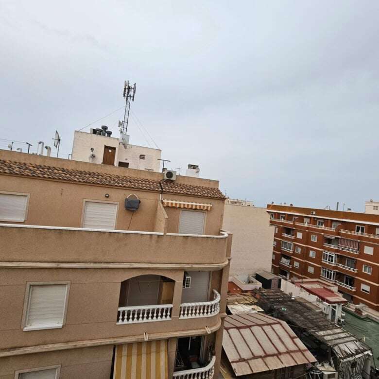Penthouse apartment with stunning city views in Torrevieja, featuring two bedrooms and modern amenit.