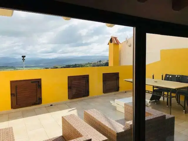 Beautiful terrace view from a 3-bedroom house in Chiaramonti, Sardinia. Perfect for relaxing and enj.