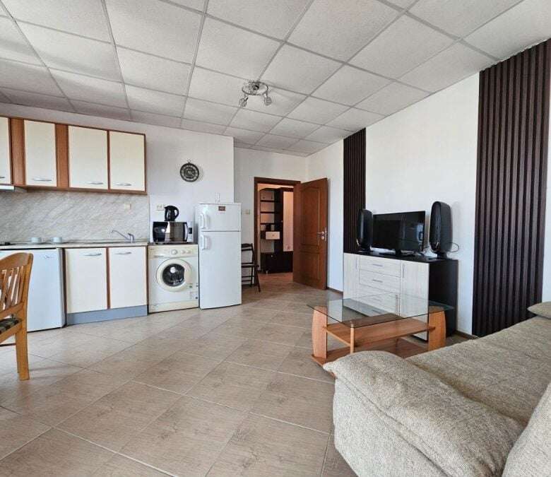 Spacious 2-bedroom apartment in Amadeus 3, Sunny Beach, with open-plan living area and modern kitche.