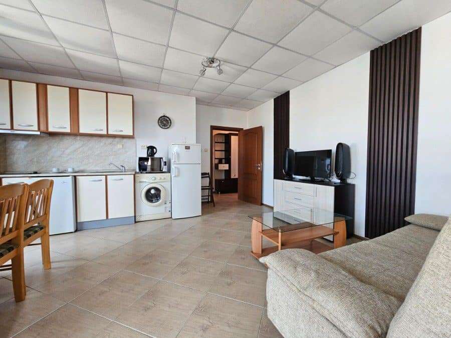 Spacious 2-bedroom apartment in Amadeus 3, Sunny Beach, with open-plan living area and modern kitche.