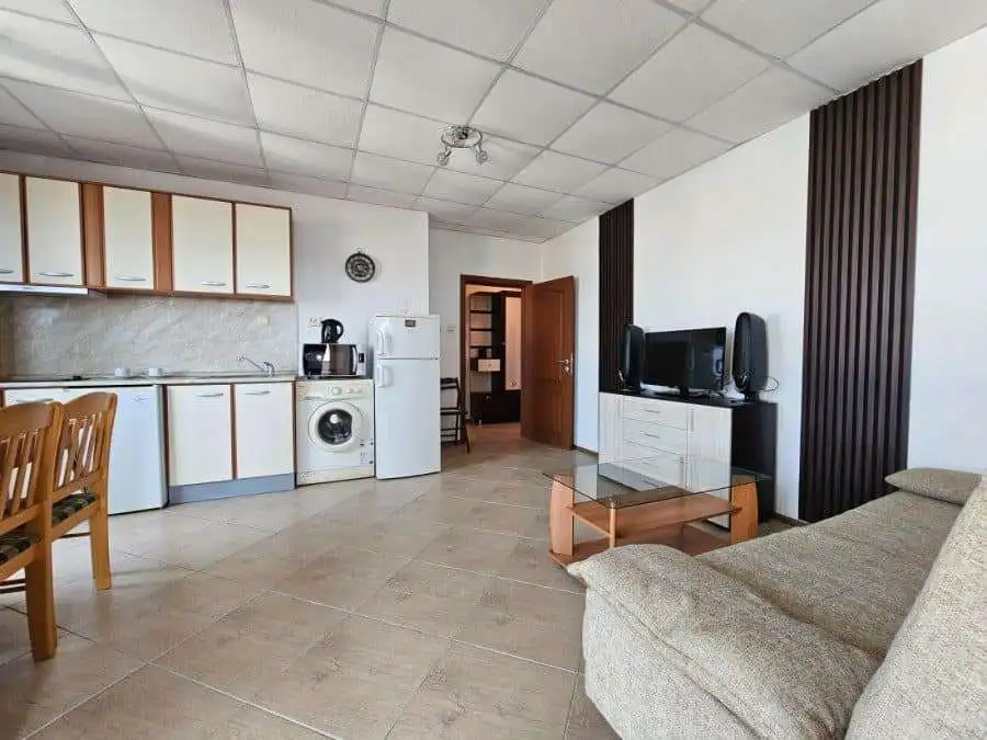 Spacious 2-bedroom apartment in Amadeus 3, Sunny Beach, with open-plan living area and modern kitche.