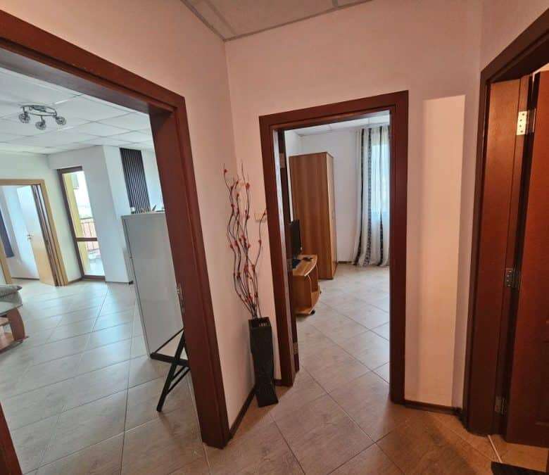 Interior view of a 2-bedroom apartment in Amadeus 3, Sunny Beach, showing living area and bedrooms.
