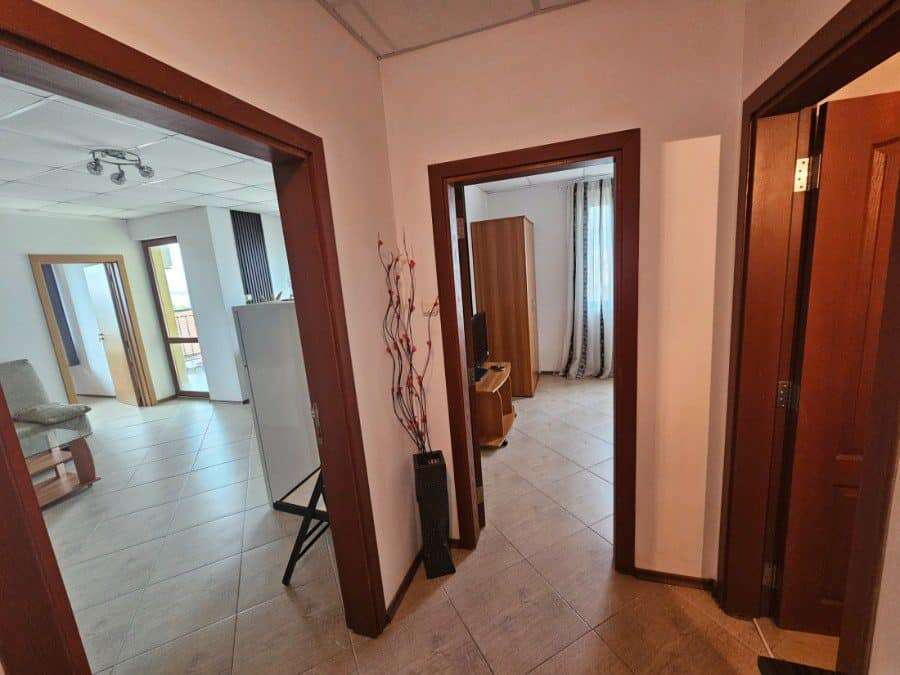 Interior view of a 2-bedroom apartment in Amadeus 3, Sunny Beach, showing living area and bedrooms.