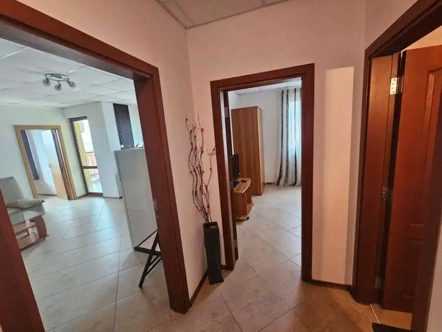 Interior view of a 2-bedroom apartment in Amadeus 3, Sunny Beach, showing living area and bedrooms.