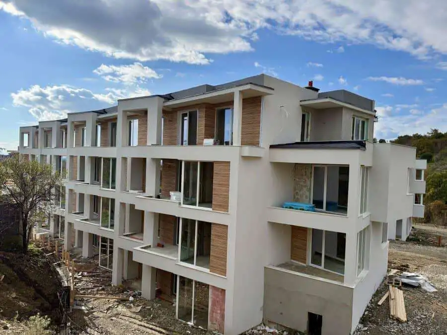 Modern Sveti Vlas apartment building with multiple balconies and large windows.