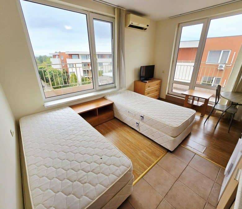 Bright studio apartment with balcony overlooking the pool at Nessebar Fort club, Sunny Beach.