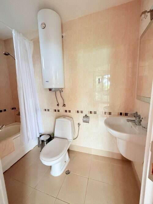 Bright and spacious bathroom with modern fixtures in Bulgaria property.