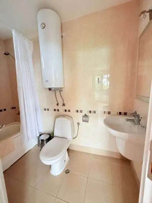 Bright and spacious bathroom with modern fixtures in Bulgaria property.