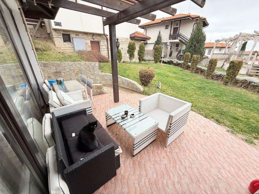 Modern ground floor apartment in Bay View Villas, Kosharitsa, Bulgaria Ground floor apartment terrace with outdoor furniture and cat, near the sea in Bulgaria.