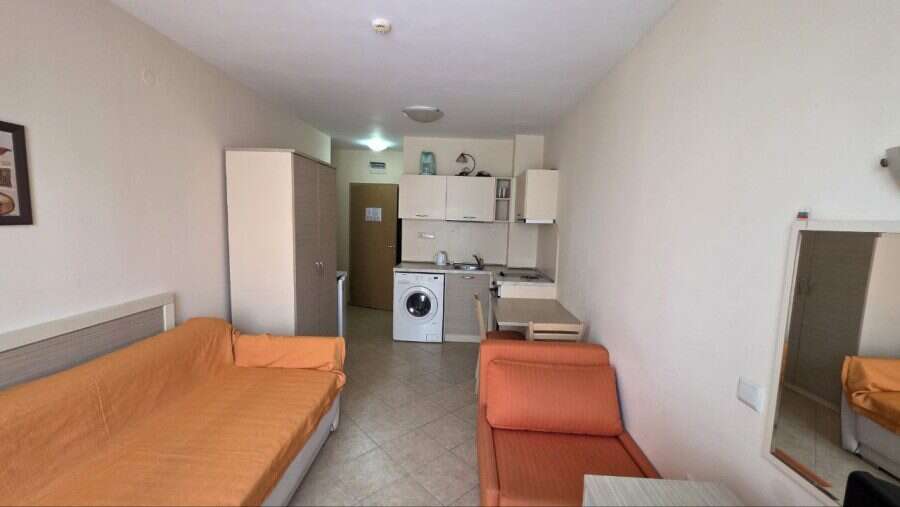 Interior view of a compact studio apartment near the sea in Royal Sun.
