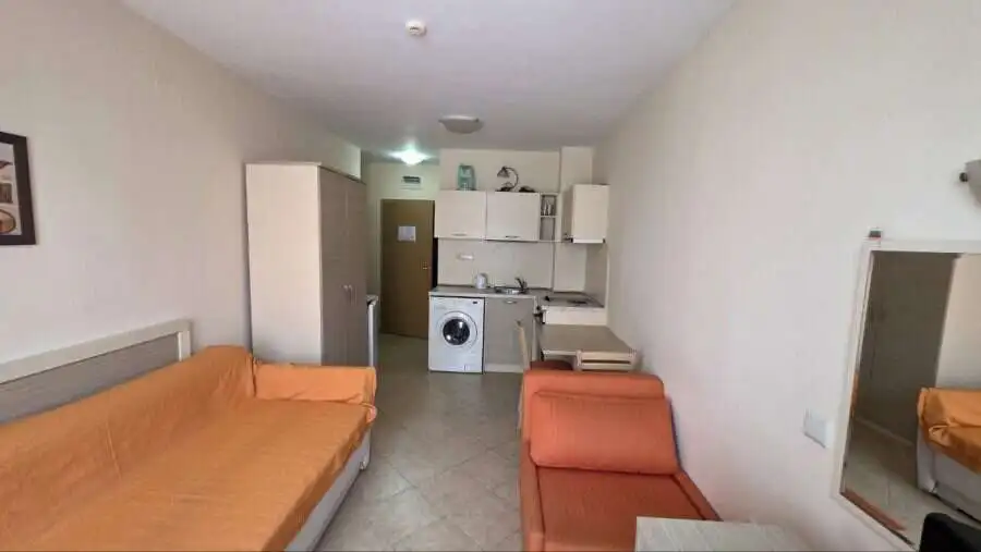 Interior view of a compact studio apartment near the sea in Royal Sun.