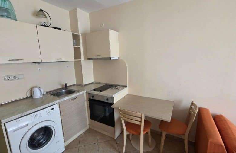 Small studio apartment with kitchen and seating area near the sea in Sunny Beach.