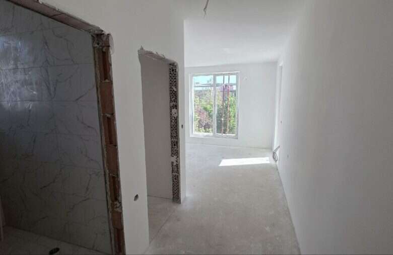 Bright, unfurnished studio apartment in La Mer Silver Residence 2, just 500m from the sea in Sunny B.